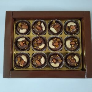 ChocoMousse Bites: Bite-sized chocolate cups filled with creamy mousse and topped with crunchy dry fruits.
