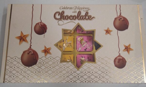 Premium Assorted Chocolate Box: 18 chocolates in 6 flavors—Butterscotch, Blueberry, Rasmalai, Rose, Almond, and Paan. A perfect luxury treat.