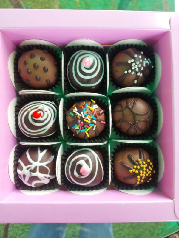 Assorted Chocolate Truffle Box (9 pcs) featuring a delicious mix of milk and dark chocolate truffles, elegantly arranged for gifting or indulgence
