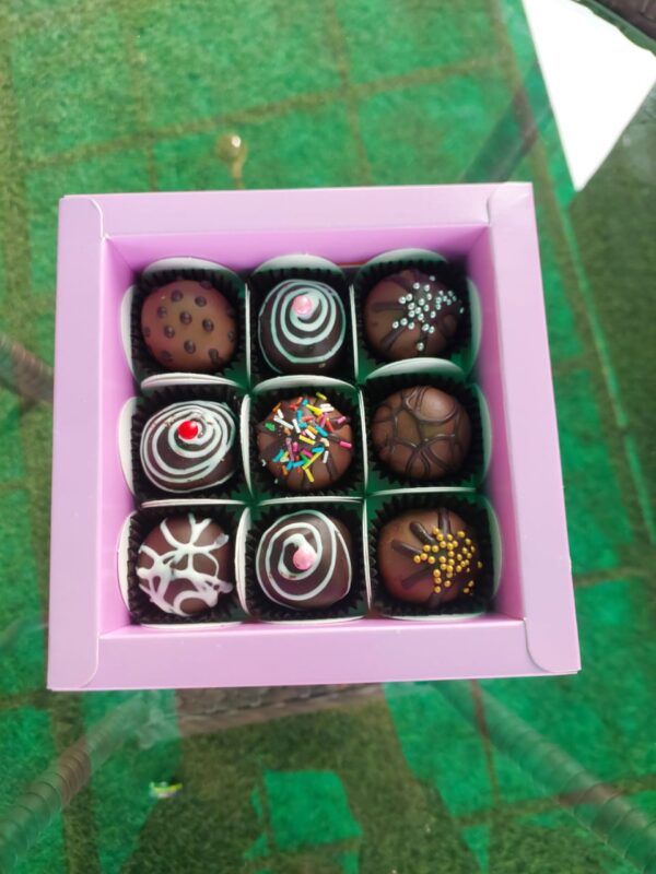 Assorted Chocolate Truffle Box (9 pcs) featuring a delicious mix of milk and dark chocolate truffles, elegantly arranged for gifting or indulgence